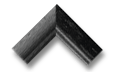 Corner sample of a rustic wood picture frame in charcoal black