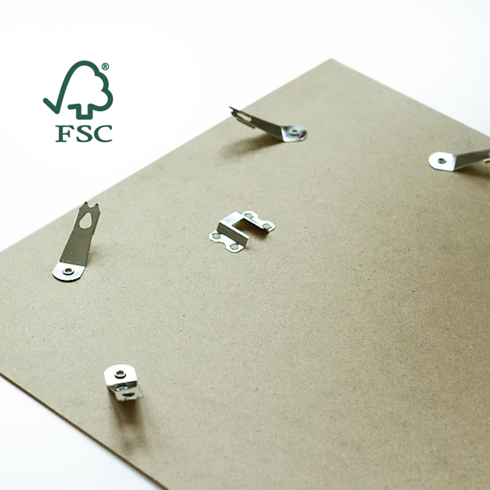Back of an FSC certified picture frame with metal hanging clips and flexible tabs